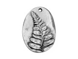 For a look inspired by nature, try this Nunn Design charm. This bold charm features an organic oval shape and a raised design of a fern frond on the front. The fern is beautifully detailed and full of lovely texture. The back of the charm is smooth and plain. Use the hole at the top of the charm to showcase this piece in your designs. It would look great at the center of a necklace.