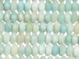 Bring beautiful color to your designs with the Dakota Stones Amazonite 8mm faceted roundel beads. Available by the strand, these beads feature a classic rounded shape with facets cut into the surface for extra shine. They are the perfect size for matching jewelry sets. It ranges in color from blue-green to green. It is an opaque stone, often found with white, yellow or gray inclusions and a silky luster or silvery sheen. Amazonite is also known as Amazon stone. Metaphysical Properties: Amazonite is said to balance energy, while promoting harmony and universal love. It is often called the stone of courage and the stone of truth, as it provides the ability to discover truths and integrity.Because gemstones are natural materials, appearances may vary from piece to piece. Each strand includes approximately 24 beads.