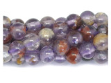 Add gemstone style to your next design with these beads from Dakota stones. Cacoxenite is the trade name for this naturally occurring blend of seven stone types. This stone, often called the "Super Seven" or "Melody Stone" contains amethyst, clear quartz, smoky quartz, lepidocrosite, goethite, and rutile. These versatile round beads are perfect for any kind of jewelry design, from necklaces and bracelets to earrings. Their large stringing hole makes these beads great for use with thicker stringing materials. You'll love the smoky purple and brown colors. Metaphysical Properties: Cacoxenite is said to be a healing and harmonizing stone. Because gemstones are natural materials, appearances may vary from bead to bead.