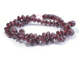 Add a glittering display to your style with these gemstone beads from Dakota Stones. These red garnet beads feature a round coin shape with diamond-shaped facets cut into the surface for extra shine. The dark red color of these beads gleams beautifully from every angle. These beads are versatile in size, so you can use them in necklaces, bracelets, and even earrings. Metaphysical Properties: Garnet is said to be a stone that utilizes creative energy.Because gemstones are natural materials, appearances may vary from piece to piece.