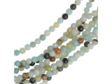 Bring colorful style to projects with the Dakota Stones black gold Amazonite 4mm round beads. These round beads will add classic shape to your designs, so you can use them in all kinds of projects. Gemstone beads are the perfect way to add natural beauty to your jewelry designs. These beads are small in size, so they would make fun accents for earrings or necklaces. Black gold Amazonite contains Amazonite, Tourmaline and pyrite all in one light blue and black stone. Metaphysical Properties: Black gold Amazonite is often used to become a better communicator. It is also said to stop fearful feelings during confrontation or when reflecting on painful memories.Because gemstones are natural materials, appearances may vary from piece to piece. Each strand includes approximately 52 beads.