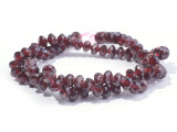 Add a glittering display to your style with these gemstone beads from Dakota Stones. These red garnet beads feature a classic rondelle shape with diamond-shaped facets cut into the surface for extra shine. The dark red color of these beads gleams beautifully from every angle. These beads are versatile in size, so you can use them in necklaces, bracelets, and even earrings. Metaphysical Properties: Garnet is said to be a stone that utilizes creative energy.Because gemstones are natural materials, appearances may vary from piece to piece.