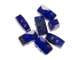 For colorful elegance in your designs, try these lapis beads from Dakota Stones. These beads feature a rectangular shape with two stringing holes. They are versatile in size, so you can add them to multi-strand looks, use them as cute watch bands, and more. These gemstone beads feature the rich blue color lapis is known for. Lapis is a semi-precious stone that was among the first gemstones to be worn as jewelry. Metaphysical Properties: Lapis is said to enhance insight, intellect and awareness.Because gemstones are natural materials, appearances may vary from piece to piece. Each strand includes approximately 40 beads.
