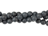 Daring style fills these Dakota Stones beads. Available by the strand, these gemstone beads are perfectly round in shape, so you can use them in all kinds of styles. Each bead features a wide stringing hole, perfect for using with thicker stringing materials like leather cord. These beads feature daring black color with a matte finish. Onyx is a variety of chalcedony that is similar to agate, with straight rather than curved bands. It has a Mohs hardness of 6-7. Metaphysical Properties: Often known as a protection stone, onyx absorbs and dissolves negative energy from the body.Because gemstones are natural materials, appearances may vary from bead to bead. Each strand includes approximately 24 beads.