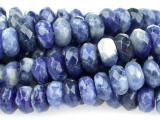 Showcase unique beauty in your designs with the Dakota Stones 8mm sodalite faceted roundel beads. Available by the strand, these rounded beads feature diamond-shaped facets cut into the surface for an extra shiny look. They are the perfect size for matching necklace and bracelet sets. These beads feature dark blue color with hints of cloudy white and gray. Use these gemstone beads to add rich style to your designs.Because gemstones are natural materials, appearances may vary from piece to piece. Each strand includes approximately 24 beads.