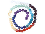 This Dakota Stones Chakra Stones 6mm Large Hole Round Bead Strand contains 8 different varieties of gemstones representing the different Chakras. The included gemstones are Amethyst, Lapis, Blue Apatite, Green Aventurine, Citrine, Carnelian, Red Garnet and Crystal Quartz.  Their large hole makes them easy to use with thicker stringing materials. Each strand includes approximately 64 beads, with about 8 in each color. Size: 6mm Hole Size: 1.5mm