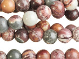 Bring gemstone style to your designs with these Sonora jasper beads from Dakota Stones. These beads feature a classic round shape. Sonora jasper is also known as Sonora dendritic. They get their name from there they are mined in Sonora, Mexico. These stones feature colors including shades of blue-gray, rust, gold, and rose along with deep maroon dendrites. Because gemstones are natural materials, appearances may vary from piece to piece.