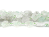 Bring the organic beauty of gemstones to your designs with the Dakota Stones 10 x 18mm fuschite in quartz rough nugget beads. Available by the strand, these gemstone beads take on jagged, rock-like shapes. The cloudy-white quartz is decorated with patches of green and brown fuschite. Add them to necklaces, bracelets and earrings and brighten up your style. This stone is also known as Rock Quartz and represents creativity. Because gemstones are natural materials, appearances may vary from bead to bead.