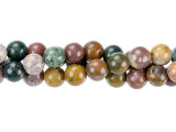 Mesmerizing style fills these Dakota Stones gemstone beads. They are perfectly round in shape and are a versatile size. Use them in necklaces, bracelets, and earrings. Named for the village near where it is found in Madagascar, Kabamby Ocean Jasper is known for its colors - dark green and mustardy yellow, with accents of pink, red, and white. You'll also love the beautiful patterns. Metaphysical Properties: Ocean Jasper is believed to be linked to the lost city of Atlantis and to hold mystic knowledge. Because gemstones are natural materials, appearances may vary from bead to bead. Each strand includes approximately 34 beads. 