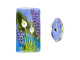 Bring floral beauty to designs with this Grace Lampwork kalera bead. This bold focal bead is rectangular in shape and features a puffed dimension, so it's sure to stand out in your style. Both sides of the bead feature a raised design of purple and white flowers on a blue and green background. It will put you in mind of a peaceful lake at springtime. String this bead onto a head pin to turn it into a pendant, or string it in an asymmetrical necklace design.This item is handmade, so appearances may vary. Length 38-38.5mm, Width 20-21mm