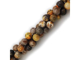 Bumblebee Jasper is a warm mixture of yellows and grays, with some white and orange. Many of the beads on each strand are striped, and some are spotted, giving the effect of a fuzzy bumblebee with patches of pollen, weaving through the air from flower to flower. Jasper is a semiprecious chalcedony (or microcrystalline quartz). It derives its colorful patterns from other minerals present, and is often named according to its pattern. The Greek origin of the word jasper, iaspis, means "spotted stone." Jasper has a dull luster but takes a fine polish, and its hardness and other physical properties are those of quartz. Due to its earthy colors and microcrystalline quartz structure, Jasper is considered to be a nurturing stone. Gray jaspers are believed to bring serenity and unity, as well as filter distractions and increase motivation. If using jasper beads for chakras, choose a jasper that contains colors relevant to the chakras that are the target of your focus -- in this case, shades of yellow for the navel (solar plexus) chakra, for issues with self-esteem and personal power.With each purchase of bumblebee jasper, you're also helping power up the Pollinator Partnership! Find related items below, and find out more about jasper in our Gemstone Index.