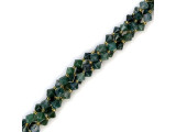 Moss Agate: Also known as mocha stone beads, moss agate beads contain dense inclusions of green hornblende, a basic silicate mineral. These semiprecious beads provide lush green hues reminiscent of Pacific Northwest rainforests and the Irish countryside. Moss agate is said to enhance a love of nature, cleanse the soul, and help restore a sense of wit.      Please see the Related Products links below for similar items, and more information about this stone.