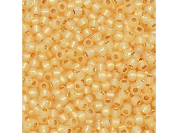 TOHO Glass Seed Bead, Size 11, 2.1mm, PermaFinish - Silver-Lined Milky Lt Topaz (Tube)