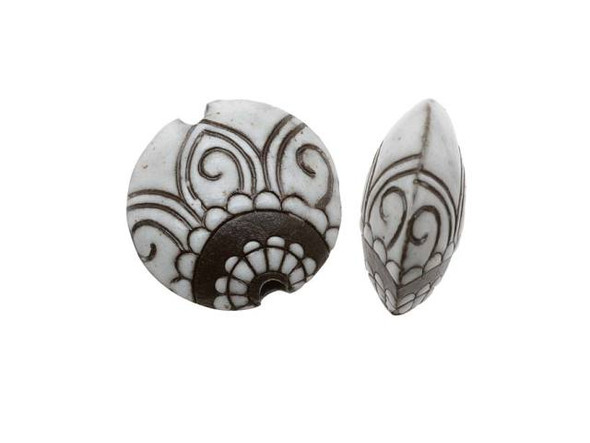Create a touch of natural elegance to your DIY jewelry with Golem Design Studio ceramic beads. With exquisite glazed lentil abstract flower design, this white and brown bead is perfect for both a small focal in a necklace design or in a bold bracelet. Handmade and versatile with a width of 23mm, length of 22mm, and a lentil coin shape, this bead is sure to elevate your creativity. The bead is made of stoneware clay and the floral paisley design is applied by hand, making each piece unique. Shop now and be dazzled by this stunning bead that's sure to impress.
