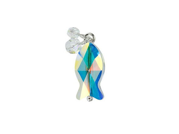 Keep your designs cute with this PRESTIGE Crystal Components charm. This little dangle is part of the PRESTIGE Crystal Components Cutie Cutes line, a charming and playful collection of crystal combinations that will bring a touch of joy to your jewelry designs. Each one tells a story and becomes an emoji all of its own within your projects. It's the perfect way to create meaningful styles. This charm features a fish-shaped crystal and two small round crystal dangles. Use the attached loop to add this charm to your designs.