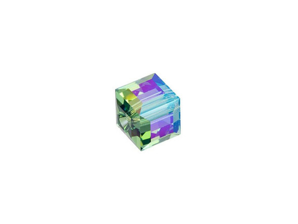 Bring geometric flair to your projects with this PRESTIGE Crystal Components cube bead. This modern bead features a cube shape with precision-cut facets for sparkle from every angle. This bead is perfect for creating a playful feel in your designs. Try it in necklaces, bracelets and even earrings. It's sure to add excitement to your style. This bead is versatile in size, so you can use it in necklaces, bracelets, and earrings. The shimmer effect is a special coating specifically designed to capture movement. This effect adds brilliance, color vibrancy, and unique light refraction. This bead features a soft green color with the shimmer effect adding iridescent blue and gold gleam.The Shimmer B coating is only applied to three sides of the cube bead.Sold in increments of 6