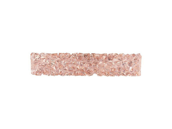 Unforgettable sparkle shines in this PRESTIGE Crystal Components bead. This Fine Rocks tube bead is a wonderful way to dress up any jewelry design. String into bead patterns, stitch it into sewing projects, use it on leather, and more. However you use it, it will bring a glittering pave look to designs. The surface is covered in double-pointed size PP14 chatons. This short tube bead does not feature end caps, so you can layer several together, easily integrate it into unique color palettes, and more.
