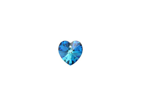 Tropical seas come to mind when viewing this PRESTIGE Crystal Components heart pendant, which features shifting colors of vivid aqua, teal, and dark blue. Heart-shaped jewelry is a timeless choice and this pendant offers a sparkling take on this look. Accent this gorgeous pendant with blue, green, and clear accents for an exotic color palette.Sold in increments of 6