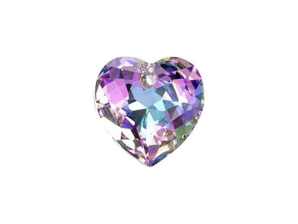 Add a modern and romantic symbol to your style with this PRESTIGE Crystal Components Heart Cut pendant. This pendant will promote a sense of everyday passion in your jewelry projects, making each design enduring and iconic. The beautiful crystal pendant sparkles at every angle. This pendant is the perfect size for a dainty focal in a necklace or you could even use it in bold earrings. This crystal features a dance of sweet purple, blue, and green colors.Sold in increments of 3