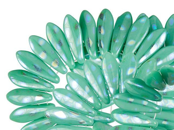 Eye-catching style can be yours with the CzechMates glass 16 x 5mm turquoise green peacock two-hole dagger beads. These beads feature a dagger shape with two stringing holes at the top of the bead. They can dangle from designs or stand out in seed bead embroidery. The two stringing holes even allow you to add them to multi-strand looks. You will have even more design possibilities when you use these beads in your projects. They feature vibrant turquoise green color with iridescent spots adding magical shine. 
