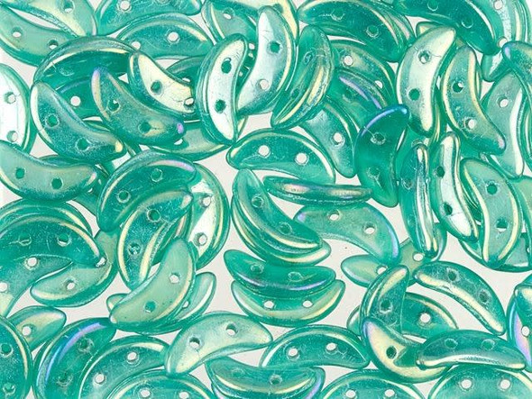 You'll love the captivating style of the CzechMates glass 4x10mm Atlantis green Iris luster 2-hole crescent beads. These flat beads feature a crescent shape, like a moon. Two stringing holes run through the center of the shape, so you can add it to designs in unique ways. Layer them with other beads in bead weaving projects or use them to add dimension to stringing projects. They would make interesting elements in bead embroidery. These beads feature turquoise green color with a subtle iridescent finish. 