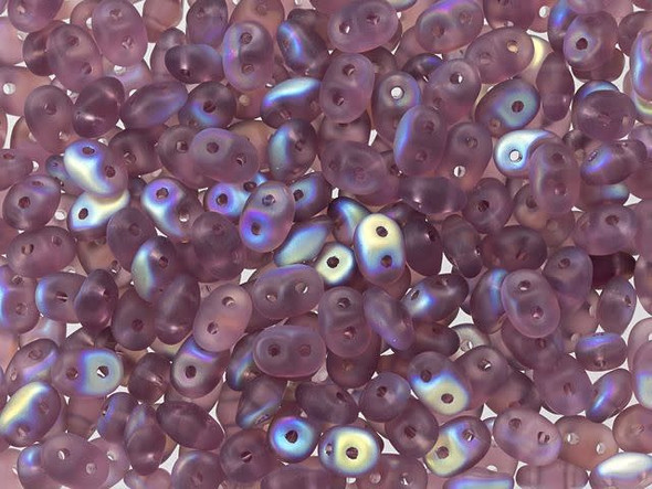 Amethyst purple color with a magical iridescence and a matte appearance fills these Matubo SuperDuo beads. Create intricate jewelry designs with Czech glass seed beads! Featuring a unique shape and two stringing holes, these seed beads add a special touch of creativity to your designs. They have tapered edges and nest up nicely when strung, making them ideal for floral and woven designs. Add a special touch to your jewelry with Czech glass seed beads!  