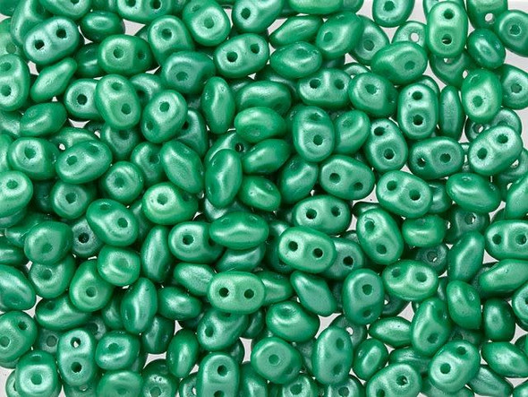 Refreshing green color with a pearlescent sheen fills these Matubo SuperDuo beads. Create intricate jewelry designs with Czech glass seed beads! Featuring a unique shape and two stringing holes, these seed beads add a special touch of creativity to your designs. They have tapered edges and nest up nicely when strung, making them ideal for floral and woven designs. Add a special touch to your jewelry with Czech glass seed beads!  