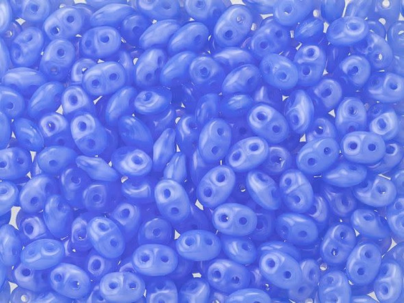 Soft and milky sapphire blue color fills these Matubo SuperDuo beads. Create intricate jewelry designs with Czech glass seed beads! Featuring a unique shape and two stringing holes, these seed beads add a special touch of creativity to your designs. They have tapered edges and nest up nicely when strung, making them ideal for floral and woven designs. Add a special touch to your jewelry with Czech glass seed beads!  