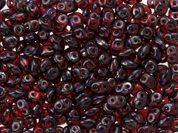 Dark red color combines with a subtle mottled Picasso finish in these Matubo SuperDuo beads. Create intricate jewelry designs with Czech glass seed beads! Featuring a unique shape and two stringing holes, these seed beads add a special touch of creativity to your designs. They have tapered edges and nest up nicely when strung, making them ideal for floral and woven designs. Add a special touch to your jewelry with Czech glass seed beads!  