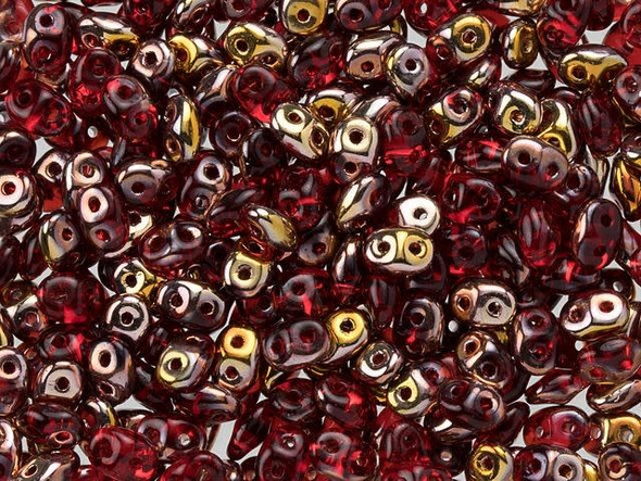 Ravishing ruby red color combines with metallic gold and copper in these Matubo SuperDuo beads. Create intricate jewelry designs with Czech glass seed beads! Featuring a unique shape and two stringing holes, these seed beads add a special touch of creativity to your designs. They have tapered edges and nest up nicely when strung, making them ideal for floral and woven designs. Add a special touch to your jewelry with Czech glass seed beads!  