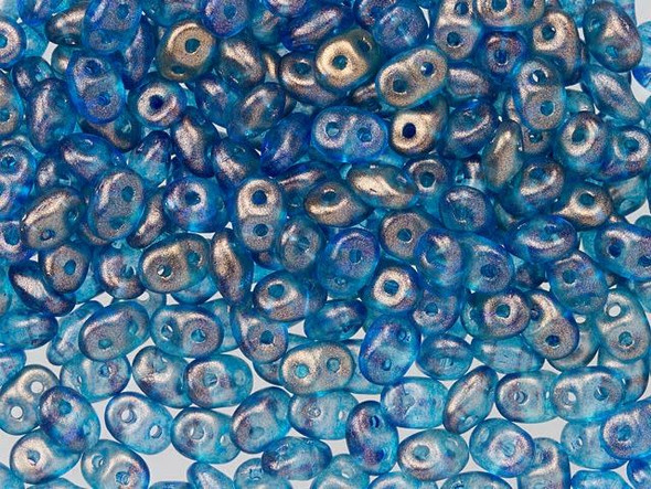 Create regal looks with these Matubo SuperDuo beads. Create intricate jewelry designs with Czech glass seed beads! Featuring a unique shape and two stringing holes, these seed beads add a special touch of creativity to your designs. They have tapered edges and nest up nicely when strung, making them ideal for floral and woven designs. Add a special touch to your jewelry with Czech glass seed beads! They feature ocean blue color with a soft golden sheen.  