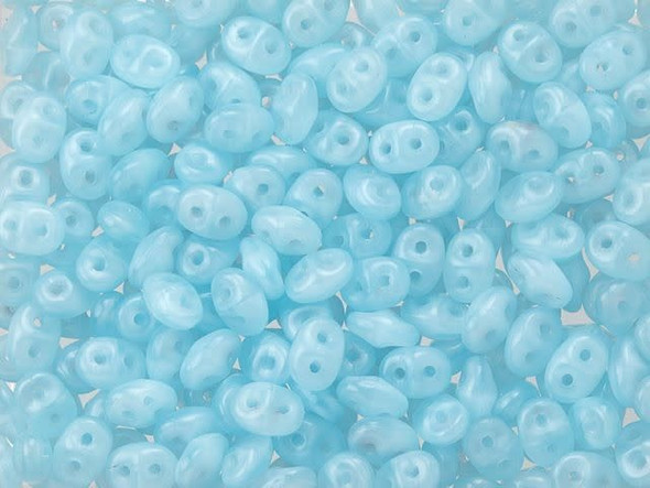 Airy and milky blue color creates elegance in these Matubo SuperDuo beads. Create intricate jewelry designs with Czech glass seed beads! Featuring a unique shape and two stringing holes, these seed beads add a special touch of creativity to your designs. They have tapered edges and nest up nicely when strung, making them ideal for floral and woven designs. Add a special touch to your jewelry with Czech glass seed beads!  