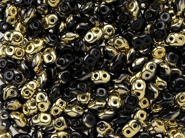 Gleaming black color combines with shining metallic gold in these Matubo SuperDuo beads. Create intricate jewelry designs with Czech glass seed beads! Featuring a unique shape and two stringing holes, these seed beads add a special touch of creativity to your designs. They have tapered edges and nest up nicely when strung, making them ideal for floral and woven designs. Add a special touch to your jewelry with Czech glass seed beads!  