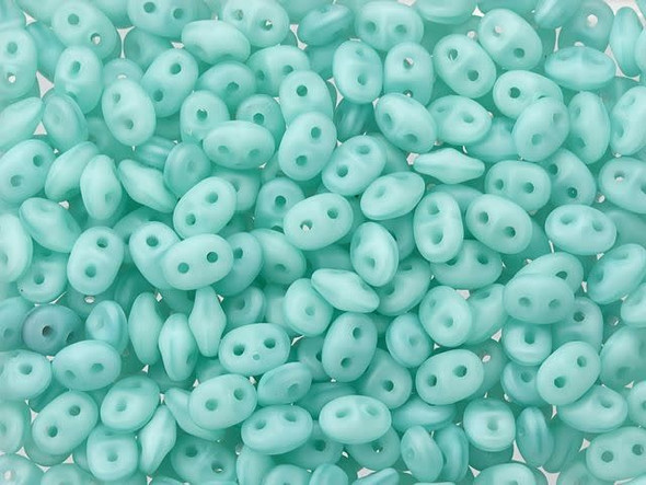 Milky seafoam color with a matte appearance fills these Matubo SuperDuo beads. Create intricate jewelry designs with Czech glass seed beads! Featuring a unique shape and two stringing holes, these seed beads add a special touch of creativity to your designs. They have tapered edges and nest up nicely when strung, making them ideal for floral and woven designs. Add a special touch to your jewelry with Czech glass seed beads!  