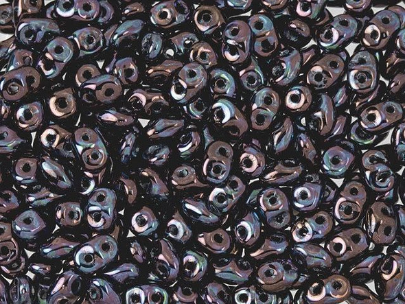 Metallic black color combines with shining purple in these Matubo SuperDuo beads. Create intricate jewelry designs with Czech glass seed beads! Featuring a unique shape and two stringing holes, these seed beads add a special touch of creativity to your designs. They have tapered edges and nest up nicely when strung, making them ideal for floral and woven designs. Add a special touch to your jewelry with Czech glass seed beads!  