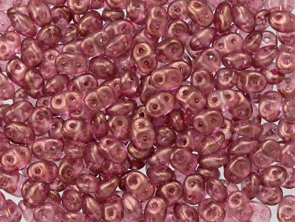 Blush pink color with a halo of frosted golden shimmer fills these Matubo SuperDuo beads. Create intricate jewelry designs with Czech glass seed beads! Featuring a unique shape and two stringing holes, these seed beads add a special touch of creativity to your designs. They have tapered edges and nest up nicely when strung, making them ideal for floral and woven designs. Add a special touch to your jewelry with Czech glass seed beads!  