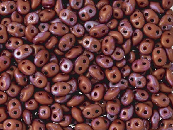 Rich red color combines with hints of magical nebula purple in these Matubo SuperDuo beads. Create intricate jewelry designs with Czech glass seed beads! Featuring a unique shape and two stringing holes, these seed beads add a special touch of creativity to your designs. They have tapered edges and nest up nicely when strung, making them ideal for floral and woven designs. Add a special touch to your jewelry with Czech glass seed beads!  