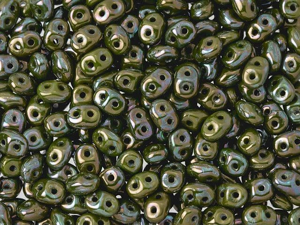 Mossy olive green color combines with a metallic nebula finish in these Matubo SuperDuo beads. Create intricate jewelry designs with Czech glass seed beads! Featuring a unique shape and two stringing holes, these seed beads add a special touch of creativity to your designs. They have tapered edges and nest up nicely when strung, making them ideal for floral and woven designs. Add a special touch to your jewelry with Czech glass seed beads!  