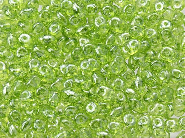 Cheerful green color with a lustrous gleam fills these Matubo SuperDuo beads. Create intricate jewelry designs with Czech glass seed beads! Featuring a unique shape and two stringing holes, these seed beads add a special touch of creativity to your designs. They have tapered edges and nest up nicely when strung, making them ideal for floral and woven designs. Add a special touch to your jewelry with Czech glass seed beads!  