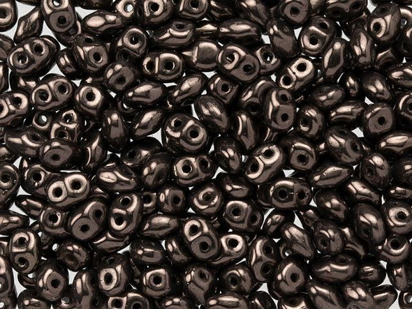 Metallic chocolate brown color shines in these Matubo SuperDuo beads. Create intricate jewelry designs with Czech glass seed beads! Featuring a unique shape and two stringing holes, these seed beads add a special touch of creativity to your designs. They have tapered edges and nest up nicely when strung, making them ideal for floral and woven designs. Add a special touch to your jewelry with Czech glass seed beads!  