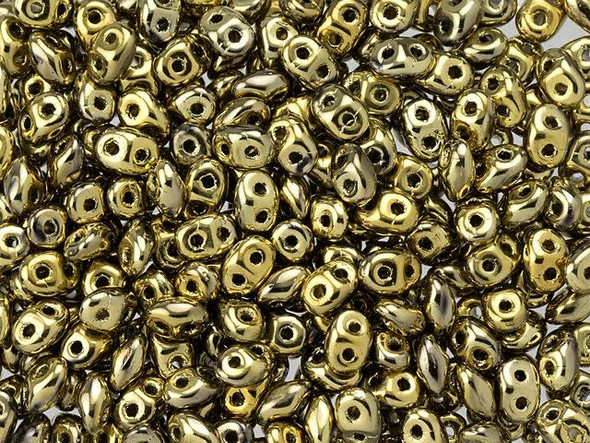 A metallic golden shine creates glamour in these Matubo SuperDuo beads. Create intricate jewelry designs with Czech glass seed beads! Featuring a unique shape and two stringing holes, these seed beads add a special touch of creativity to your designs. They have tapered edges and nest up nicely when strung, making them ideal for floral and woven designs. Add a special touch to your jewelry with Czech glass seed beads!  