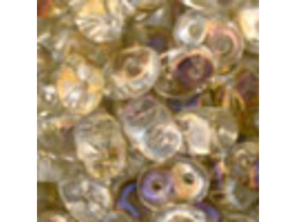 You can create shining, regal style with the SuperDuo 2-hole crystal twilight seed beads. These seed beads are unique in that they feature an innovative oval shape and two stringing holes. The side edges taper at both ends, making them perfect for floral motifs. When strung, these beads link up nicely. They are excellent for using in woven seed bead designs and will add variety of shape. These beads display a clear crystal color with a hint of golden luster. Each tube contains approximately 125 beads. Size can and will vary with each bead due to the manufacturing process. 