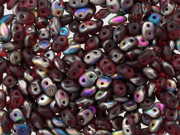 Deep red color with a futuristic iridescence and a matte appearance fills these Matubo SuperDuo beads. Create intricate jewelry designs with Czech glass seed beads! Featuring a unique shape and two stringing holes, these seed beads add a special touch of creativity to your designs. They have tapered edges and nest up nicely when strung, making them ideal for floral and woven designs. Add a special touch to your jewelry with Czech glass seed beads!  