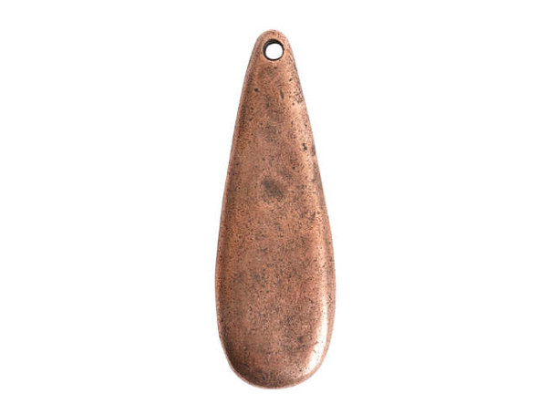 Get inspired by this Nunn Design pendant. This pendant features an elegant and elongated teardrop shape. The front surface features a textured dimension, for a handmade, artisan look. The back of this pendant is flat. Display this pendant as it is in your designs, or customize it with metal stamping or by adding epoxy clay, resin, and more. The hole at the top of this pendant makes it easy to add to designs. Use it at the center of a necklace design. It features a warm copper glow. Hole Size 1.63mm/14 gauge, Length 41mm, Width 13.5mm