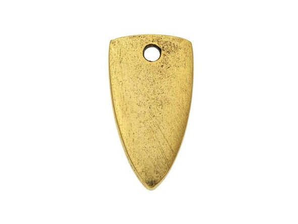 Dangle this Nunn Design charm in your designs for a daring look. This smooth, flat charm takes on the shape of an arrowhead with a point at the bottom. You can use this charm as-is or decorate it with metal stamps, epoxy clay, or other mixed media elements. A hole at the top of the charm makes it easy to add to designs. Add it to necklaces, bracelets, and even earrings. It features a regal golden glow that will add a classic touch to designs.
