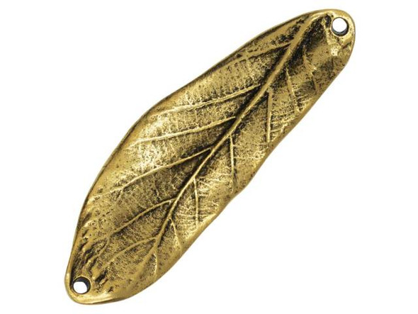 Get a look inspired by nature with this Nunn Design link. This link takes on the shape of a curved leaf full of beautiful details. The models for this link were created using organics that Becky Nunn gathered on her morning walks in Port Townsend, WA. A hole is punched through each end of the leaf, so you can easily showcase this piece in your designs. The curved shape is excellent for use as a bracelet focal. This link features a rich gold color full of classic style.