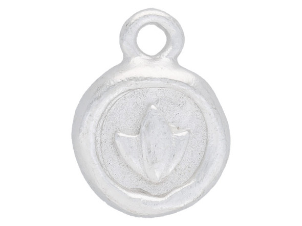 Add a meaningful detail to your designs with this itsy circle lotus charm from Nunn Design. This small charm is circular in shape and the front features a raised design of a lotus blossom. The back is plain. The lotus is a symbol of purity and enlightenment, meant to represent life and new beginnings. This charm features a bright silver color.