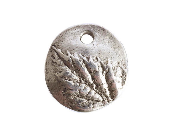 Add a leafy touch to your designs with this small berry leaf charm from Nunn Design. This charm is disc-shaped and features a raised design of leaves on the front.  The back is flat and plain. There is a hole at the top of the charm so it is easy to add it to your designs. This charm features a versatile silver shine. Diameter: 12mm, Hole Size: 2.0mm