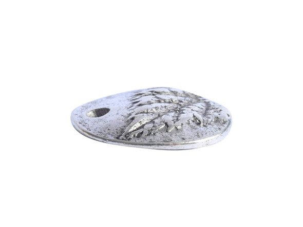 Add a leafy touch to your designs with this small berry leaf charm from Nunn Design. This charm is disc-shaped and features a raised design of leaves on the front.  The back is flat and plain. There is a hole at the top of the charm so it is easy to add it to your designs. This charm features a versatile silver shine. Diameter: 12mm, Hole Size: 2.0mm