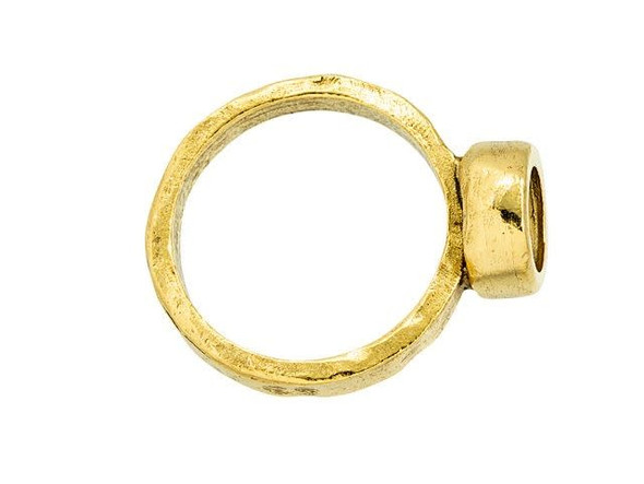 Create an elegant ring with this Nunn Design ring. This ring features a circular bezel on the front perfect for holding a PRESTIGE Crystal Components Chaton in size SS29. You can also fill the bezel with epoxy clay or resin for a completely custom look. You'll love the artisan look and feel of this ring. It features a regal golden shine. Bezel Inside Diameter 6.5mm